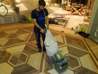 Шлифовка художественного паркета Первичная шлифовка паркетного пола